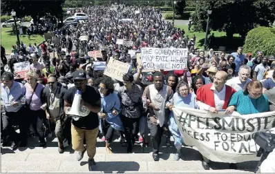  ?? PICTURE: MICHAEL WALKER ?? ARM IN ARM: UCT students, staff and academics outside Jameson Hall on Upper Campus reflect on last week’s protest against high fees. Leaders have yet to wake up to the fact that they are the problem and that a business-as-usual approach will not...