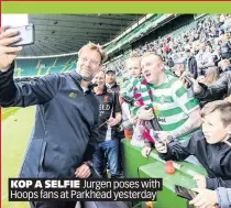  ??  ?? KOP A SELFIE Jurgen poses with Hoops PAGE fans xx at Parkhead yesterday