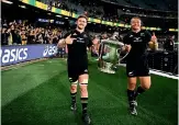  ?? GETTY IMAGES ?? All Blacks Dalton Papali’i and Caleb Clarke celebrate with the Bledisloe Cup after the 39-37 win in Melbourne.