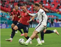  ?? (Reuters) ?? ENGLAND MIDFIELDER Jack Grealish crosses the ball for teammate Raheem Sterling (not pictured) to score the side’s lone goal in the 12th minute of a 1-0 victory over the Czech Republic in Euro 2020 Group D action at Wembley Stadium.