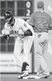  ?? Karen Warren / Staff photograph­er ?? Astros first baseman Yuli Gurriel, left, kept his bat hot after a two-homer night.