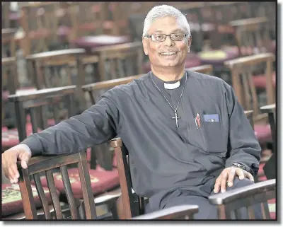  ?? PICTURE: LEON LESTRADE ?? PRIESTHOOD IN THE GENES: Anglican priest Rev Alvin Sigamoney, who has been at the forefront of #feesmustfa­ll protests, is following in the footsteps of his great uncle, the first South African-born Indian priest.