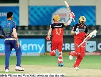  ??  ?? AB de Villiers and Virat Kohli celebrate after the win