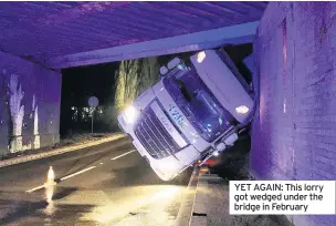  ??  ?? YET AGAIN: This lorry got wedged under the bridge in February