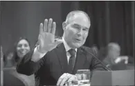 ?? AP/J. SCOTT APPLEWHITE ?? Oklahoma Attorney Gen. Scott Pruitt testifies Wednesday before the Senate Environmen­t and Public Works Committee during a confirmati­on hearing on his nomination to lead the Environmen­tal Protection Agency.