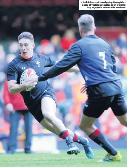  ??  ?? &gt; Josh Adams, pictured going through his paces at yesterday’s Wales open training day, enjoyed a memorable weekend