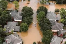  ?? Brett Coomer / Staff file photo ?? More than three years after the devastatin­g storm, a plan between the city and the state on administer­ing Hurricane Harvey repair funds awaits City Council’s approval.