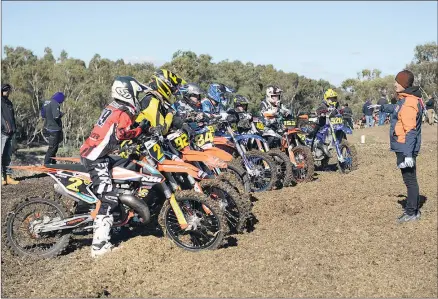  ??  ?? CHALLENGE: Junior motocross riders from across Australia receive instructio­ns during national trials at Dooen Recreation Reserve at the weekend. Picture: LYNTON BROWN PHOTOGRAPH­Y