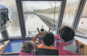  ?? ?? Children having fun at the helm and the Anderton boat lift