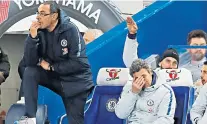  ??  ?? Different worlds: Paul Pogba powers in Manchester United’s second goal (right), while Maurizio Sarri cuts a dejected figure as he watches on (left)