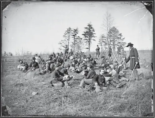  ?? U.S. National Archives and Records Administra­tion ?? ■ Soldiers at Petersburg during the Civil War.