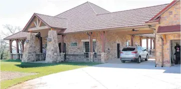  ?? [PHOTO BY PAUL HELLSTERN, THE OKLAHOMAN] ?? The front of Kurt and Joyce Swanson’s home, by Insulated Concrete Forms & More, at Meridian in eastern Logan County.