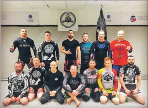  ??  ?? Members of Oban BJJ who attended the recent workshop. Back row, left to right: Dawid Loukil, Calum Galbraith, Mateusz Grabiec, Ruaridh Black, Calum Weir and Paul Byrne. Front row, left to right: Paul McGhee, Niall Adam, John Nicolson, Coogie Potter,...