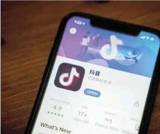  ?? /Bloomberg ?? Going to markets: The download page for ByteDance‘s Douyin app. TikTok aims to replicate abroad the e-commerce success Douyin has had in China.