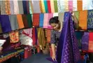  ?? ?? Houn Chenda in her shop. Photograph: Fiona Kelliher