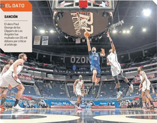  ?? / FOTO: AFP ?? Evan Fournier aprovechó la débil defensiva para encestar.