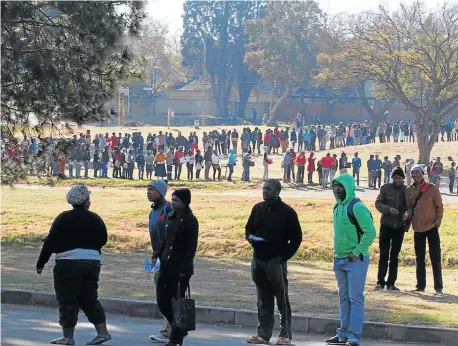  ?? Picture: BAFANA MAHLANGU ?? HOPE ON THE HORIZON: A winding queue of thousands of prospectiv­e job seekers outside the Alberton Civic Centre during the Youth Job Creation Initiative. The refreshed National Youth Service initiative is set to recruit 60 000 unemployed young people...