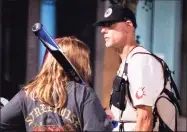  ?? Beth Nakamura / Associated Press ?? Michael Reinoehl is seen during a protest in front of Mayor Ted Wheeler's residence on Aug. 28 in Portland, Ore.