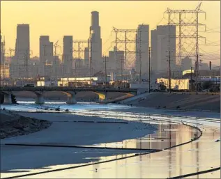  ?? Brian van der Brug Los Angeles Times ?? CONCRETE has held the Los Angeles River in place for the better part of a century.