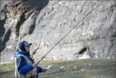  ??  ?? Dave Schmid of Bloomfield fly fishes during the PostGazett­e’s steelhead fishing trip on Nov. 16 at Folly’s End Campground in Girard, Pa.