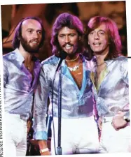  ??  ?? Songwritin­g phenomenon: The Bee Gees in 1979, from left, Maurice, Barry and Robin