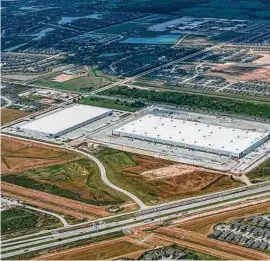  ?? JLL ?? An affiliate of Walton Street Capital purchased the 805,601-square-foot Amazon package sorting center at 22525 Clay Road in Katy.