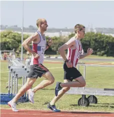  ?? ?? Paul Cardy, left, won the senior men 5000m