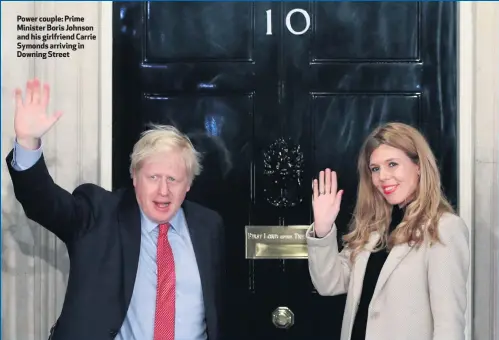  ??  ?? Power couple: Prime Minister Boris Johnson and his girlfriend Carrie Symonds arriving in Downing Street