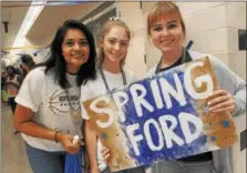  ?? GENE WALSH — DIGITAL FIRST MEDIA ?? Students wait with signs and confetti in hand before the start of taping of an interactiv­e lip- dub video at Spring-Ford Area High School Friday. About 2,400student­s from 9th to 12th grade lined the halls while a selected students lip synced to Katy...