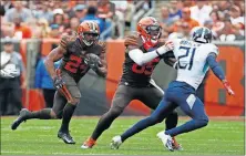  ?? [JEFF HAYNES/THE ASSOCIATED PRESS] ?? Browns running back Nick Chubb (24) runs the ball against the Titans on Sept. 8 in Cleveland.