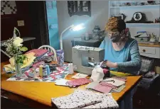  ?? DANA JENSEN/THE DAY ?? Jan Lichtenwal­ter sews cotton face masks Saturday in her Waterford home. Visit www.theday.com for a video.
“Be easy on yourself, it does take a long time to adjust to something different, particular­ly with work.”
ALIZA SHERMAN RISDAHL, AUTHOR OF 11 BOOKS INCLUDING ONE ON TIPS FOR WOMEN WORKING FROM HOME