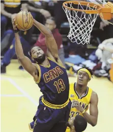  ?? AP PHOTO ?? TRISTAN THE NIGHT AWAY: Cavaliers forward Tristan Thompson grabs a rebound over Indiana’s Myles Turner in the first half of Game 3 last night in Indianapol­is.