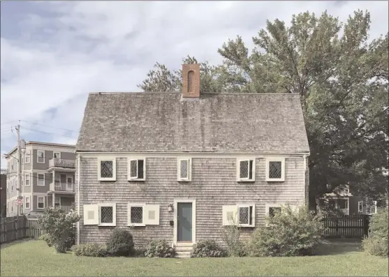  ?? The Associated Press ?? This 2018 photo provided by Tracee Herbaugh shows the exterior of the James Blake House, located in Boston's Dorchester neighborho­od. The house, built in 1661, listed as the oldest in Boston.