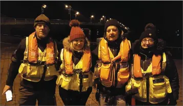  ??  ?? Nikki Hayes (second from left) on Wexford Quayfront with MarineWatc­h volunteers (from left) Rory Gallagher, supervisor Billy Dennigan and Annette McCarthy.