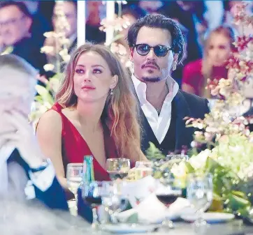  ??  ?? •Los problemas entre Amber Heard y Johnny Depp parecen no tener fin.