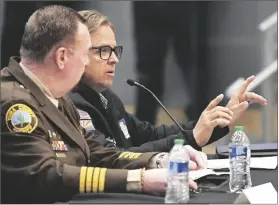  ?? buy these photos at yumasun.com PHOTO by randy HOEFT/YUMA SUN ?? LEFT: Hearing witness Jonathan Lines (right), Yuma County Board of Supervisor­s, District 2, makes presentati­on during Thursday’s committee hearing. Listening is Yuma County Sheriff Leon Wilmot, also a hearing witness.