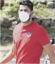  ??  ?? 0 Atletico striker Diego Costa arrives for a coronaviru­s test.