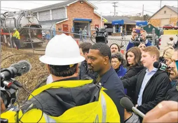  ?? PATRICK ORSAGOS AP ?? Environmen­tal Protection Agency Administra­tor Michael Regan answers questions about the safety of air and water in East Palestine, Ohio, on Thursday, days after a train carrying toxic chemicals derailed.