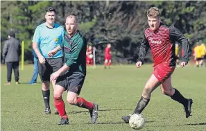  ??  ?? This Dundee City player is on the ball against Hawkhill. This match was also in the Shaun Kelly Memorial Cup second round at Riverside.