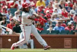  ?? JEFF ROBERSON — THE ASSOCIATED PRESS ?? Philadelph­ia Phillies’ Maikel Franco strikes out swinging during the eighth inning of a baseball game against the St. Louis Cardinals Sunday in St. Louis. The Cardinals won 5-1.