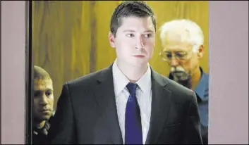  ?? JOHN MINCHILLO/THE ASSOCIATED PRESS ?? Former police officer Ray Tensing arrives in court in Cincinnati on Saturday, the fourth day of jury deliberati­ons in his murder trial. The judge declared a mistrial after the jury said it was deadlocked.