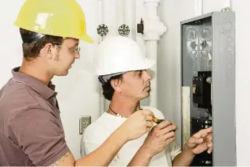  ?? Dreamstime/TNS ?? Replacing your electrical panel can enable your home to handle bigger power loads.