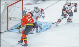  ??  ?? William Karlsson watches a shot by Reilly Smith, not pictured, beat Coyotes goaltender Ivan Prosvetov during the third period.