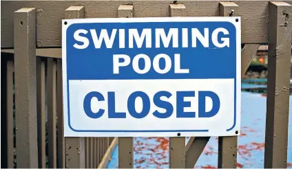  ?? ?? Uncertaint­y: a lack of lifeguards, chlorine shortages and rising energy costs are combining to create problems for pool operators