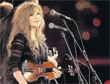  ?? Carroll County Times/AP ?? IN THE ALBUM’S song choices, Alison Krauss dips into what might be called second-generation melancholy.