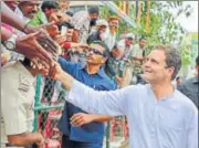  ?? PTI FILE ?? Congress President Rahul Gandhi greets his supporters during a rally ahead of the Karnataka Assembly polls in Bengaluru.