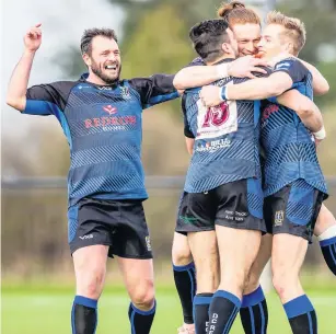  ??  ?? Dings centre Matt Smith is congratula­ted by team-mates Pictures: John White Media