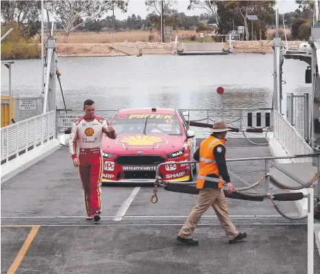  ?? Picture: SARAH REED ?? Scott McLaughlin arrives on the Tailem Bend ferry in preparatio­n for racing at the new circuit.