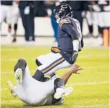  ?? ARMANDO L. SANCHEZ/CHICAGO TRIBUNE ?? Vita Vea sacks Bears quarterbac­k Nick Foles in October at Soldier Field in Chicago.