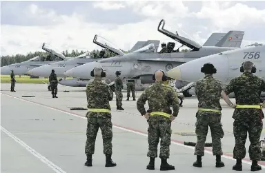  ?? Cpl Kenneth Galbraith / cana dian forces ?? Six Canadian CF-18s like these, seen in Lithuania this summer, will deploy to the Middle East.